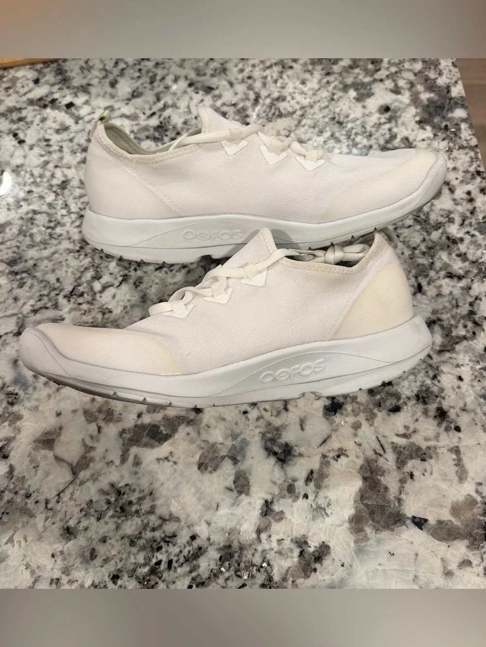 OOFOS Women's White Athletic Slip-On Sneakers with Green Insole Accent
